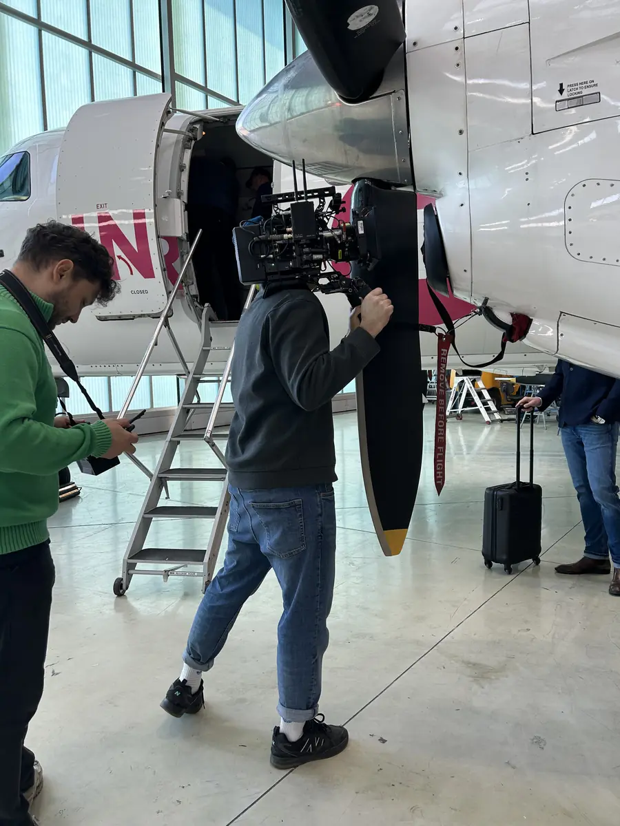 Shooting in a hangar by an aircraft