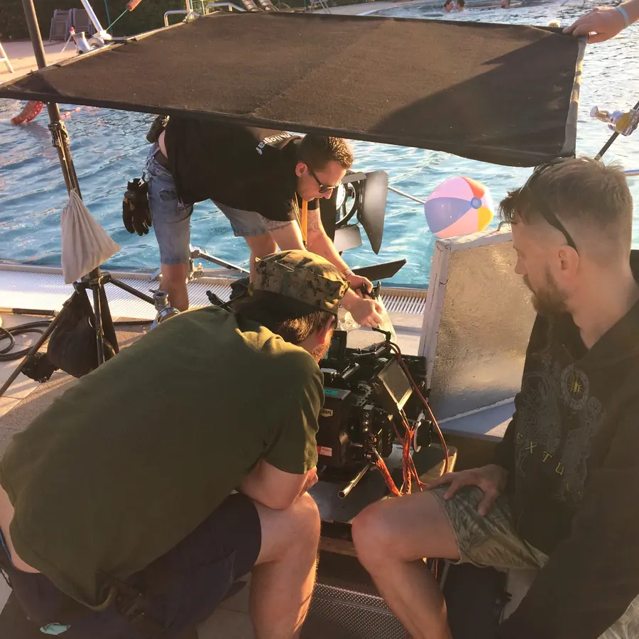 Film crew on a boat